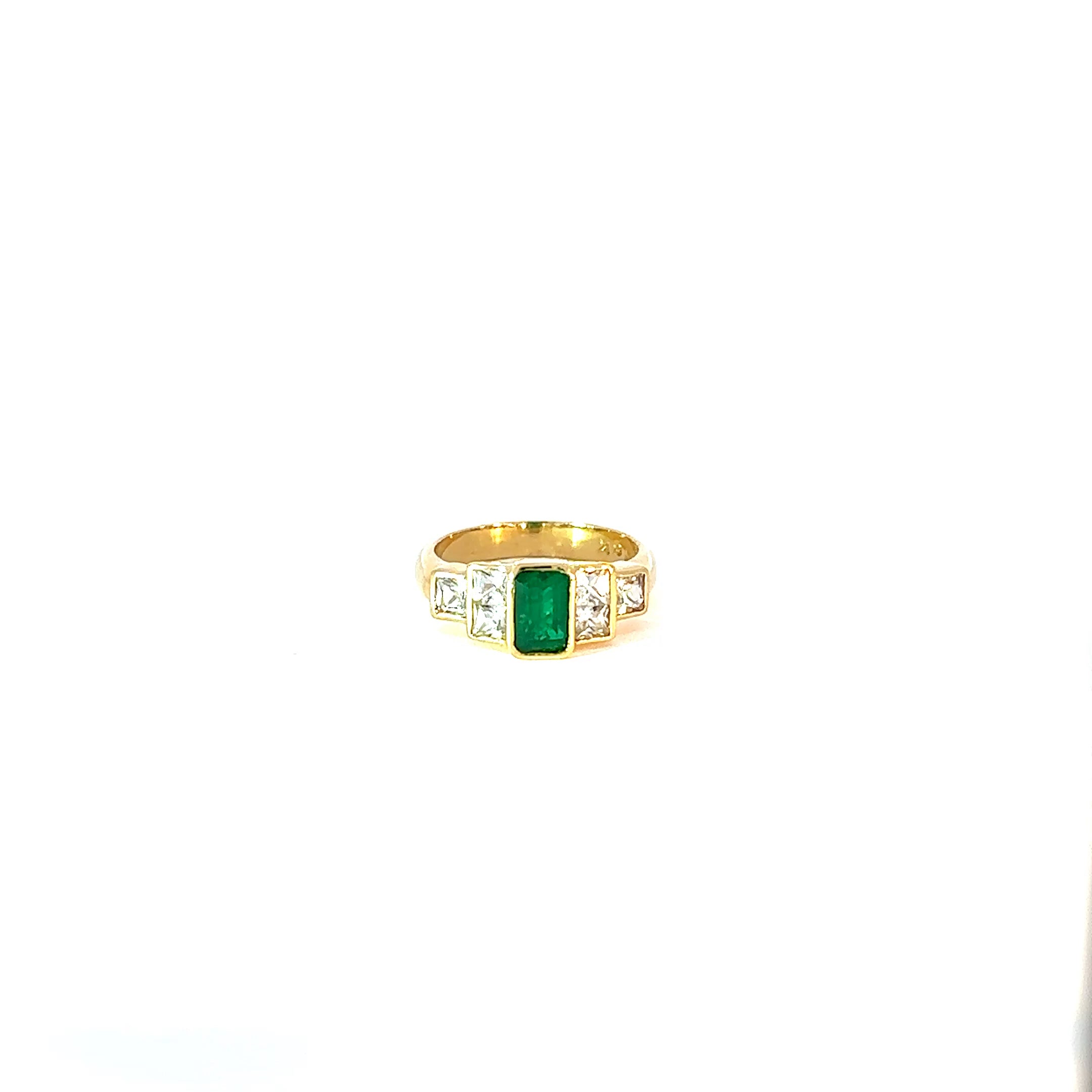 Anillo esmeralda y zafiros blancos bisel