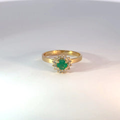 Anillo solitario oro amarillo esmeralda cluster diamantes