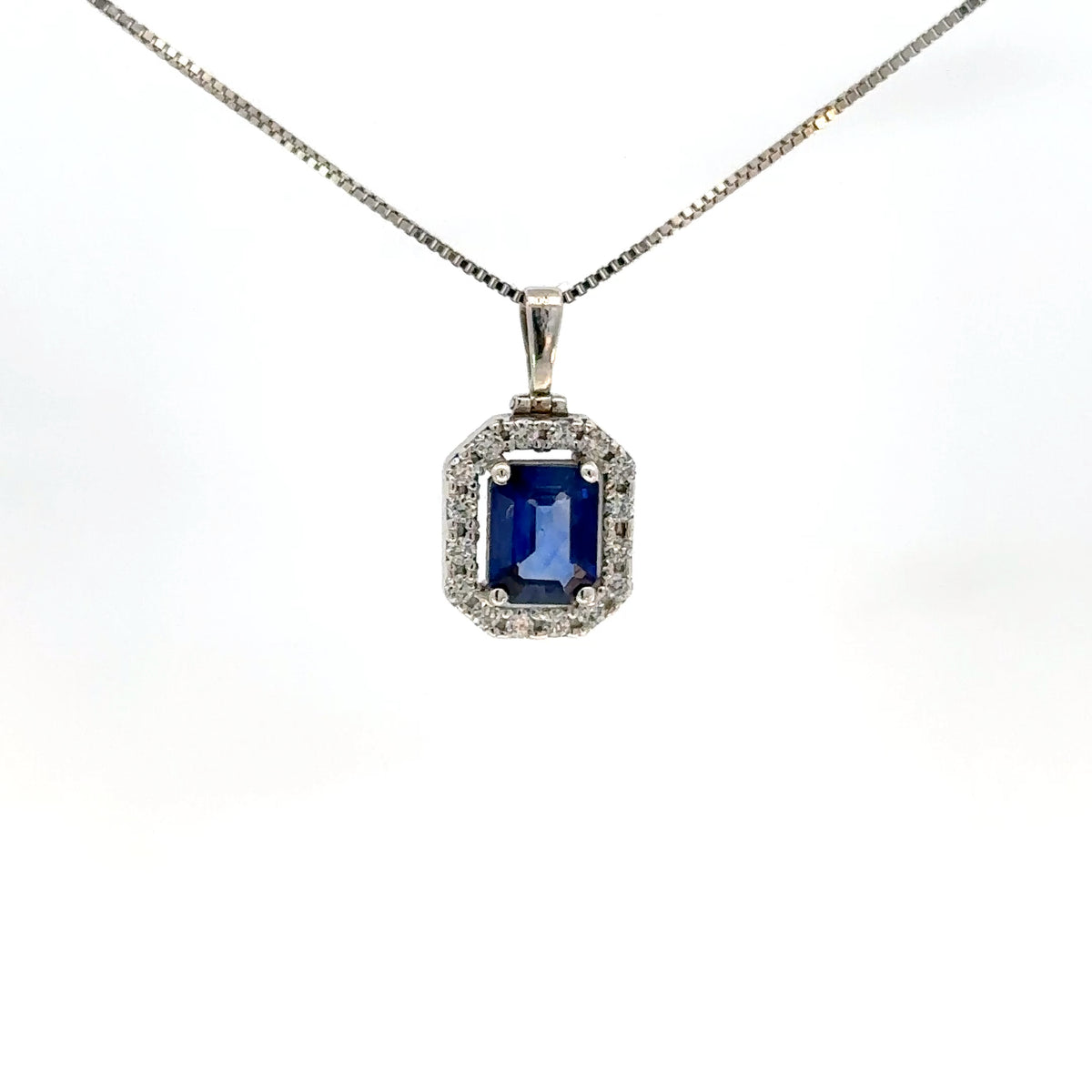 Elegante Dije en Zafiro Azul