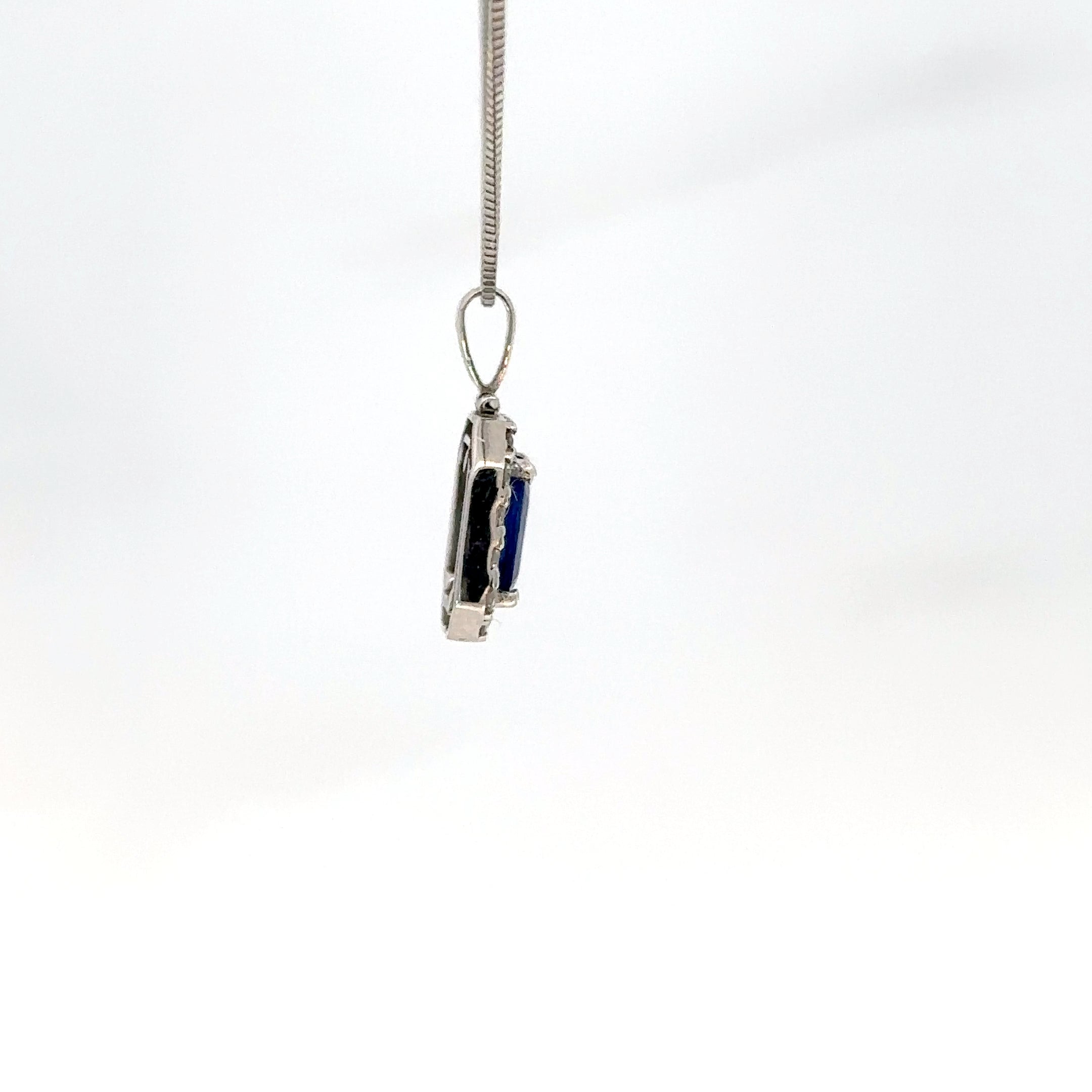 Elegante Dije en Zafiro Azul