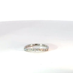 Anillo curvo en Oro Blanco con Diamantes