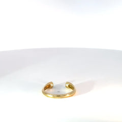 Anillo oro amarillo abierto con esmeralda bisel