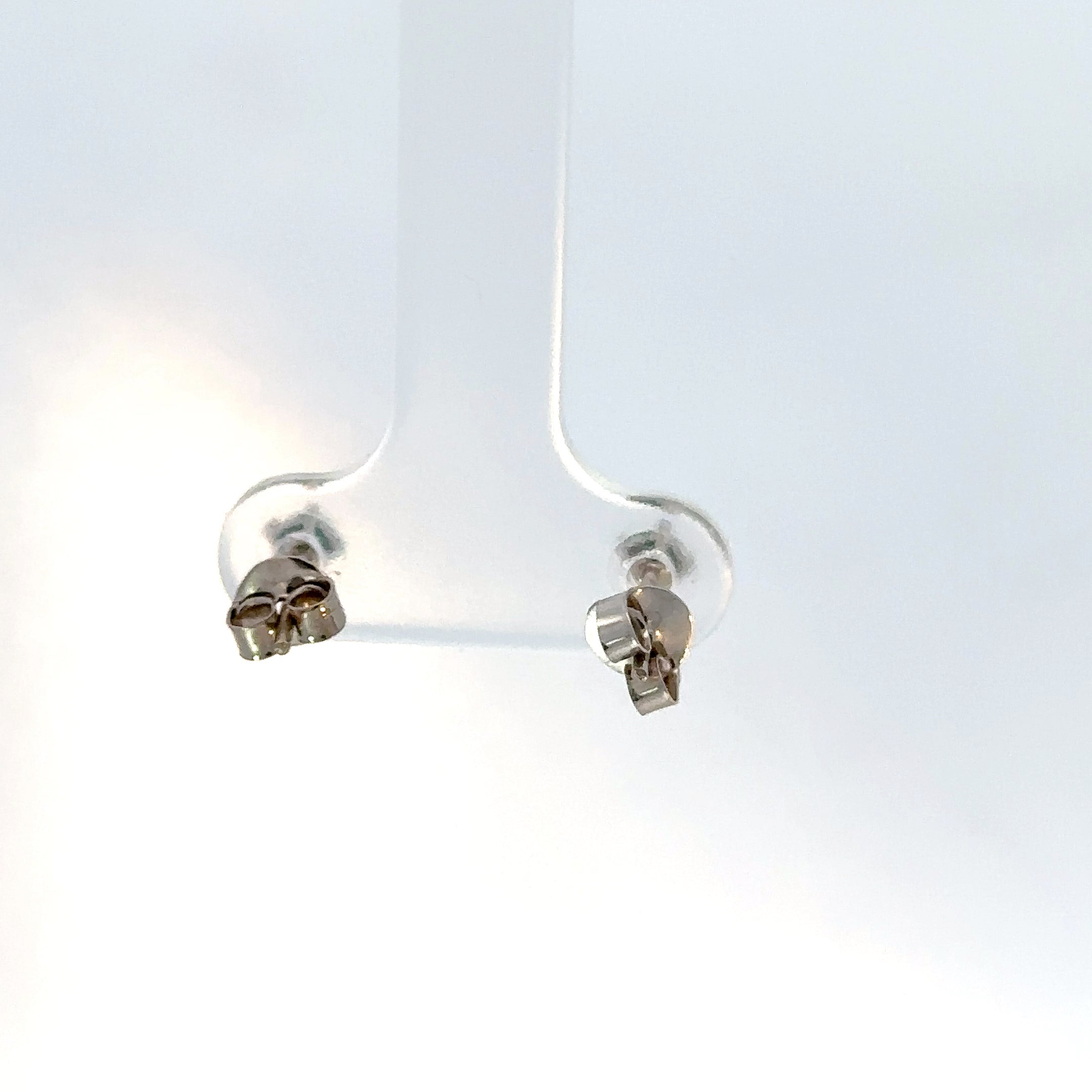 Aretes Esmeralda solitario oro blanco