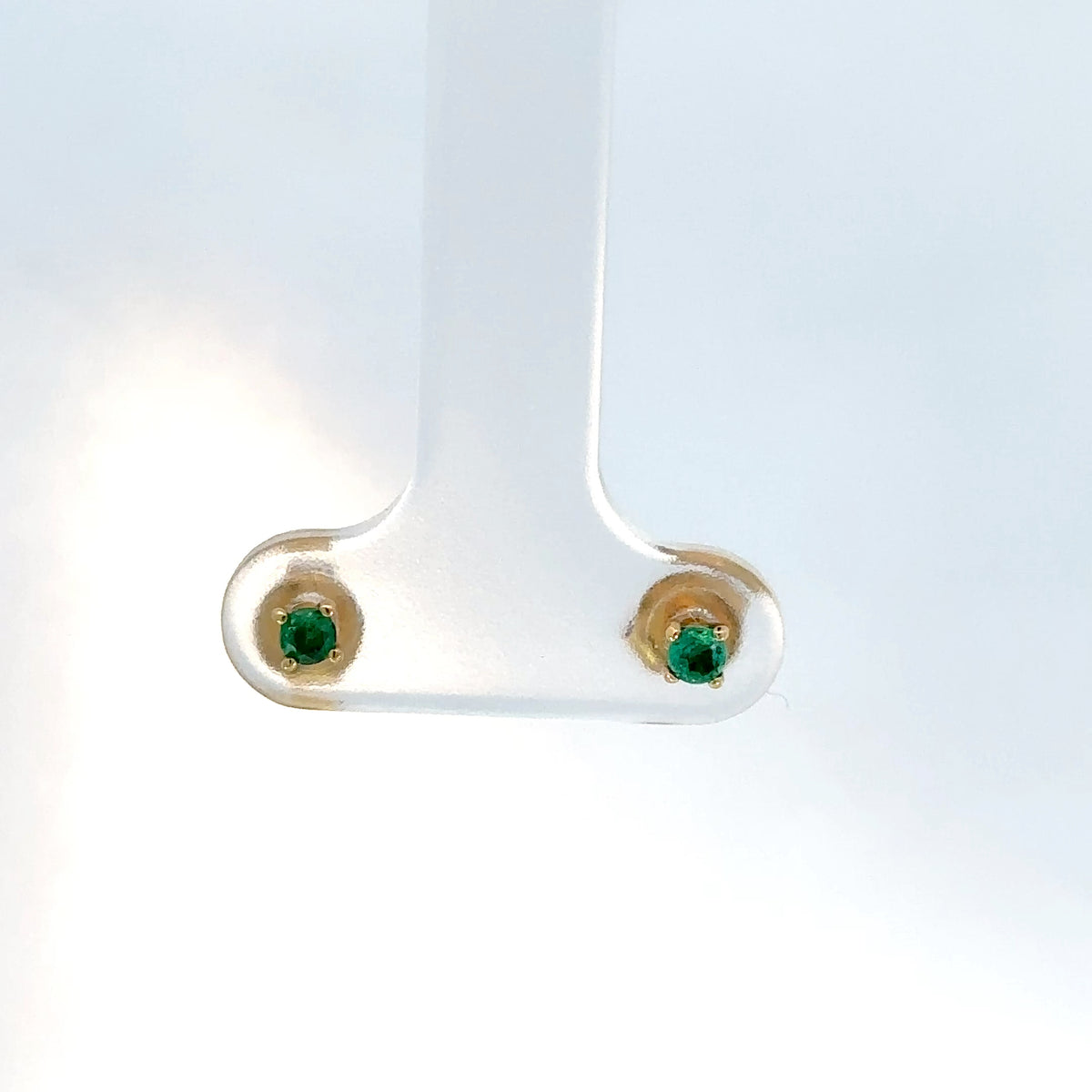 Topos oro amarillo esmeralda solitario