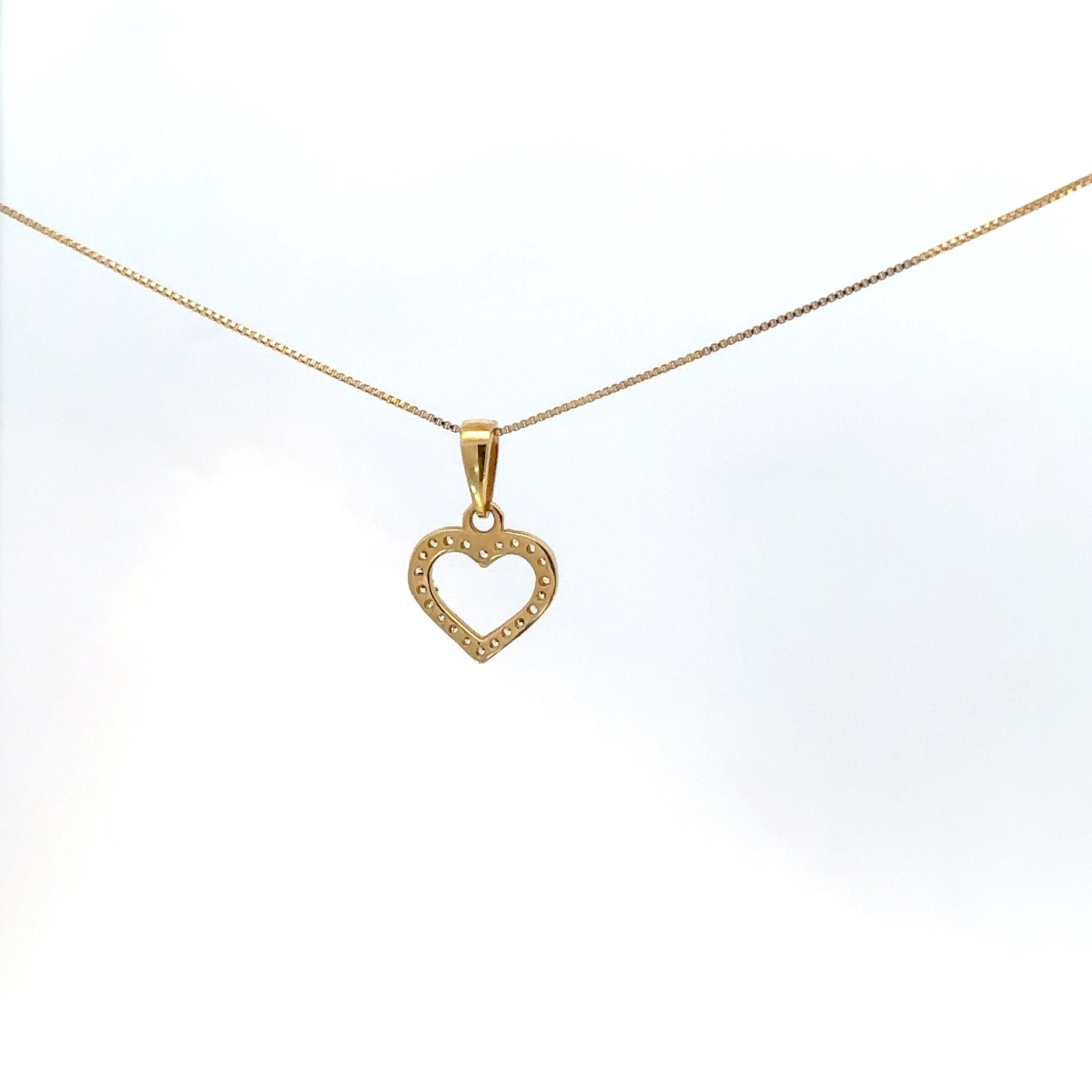 Dije de Corazón con Circones en Oro Amarillo