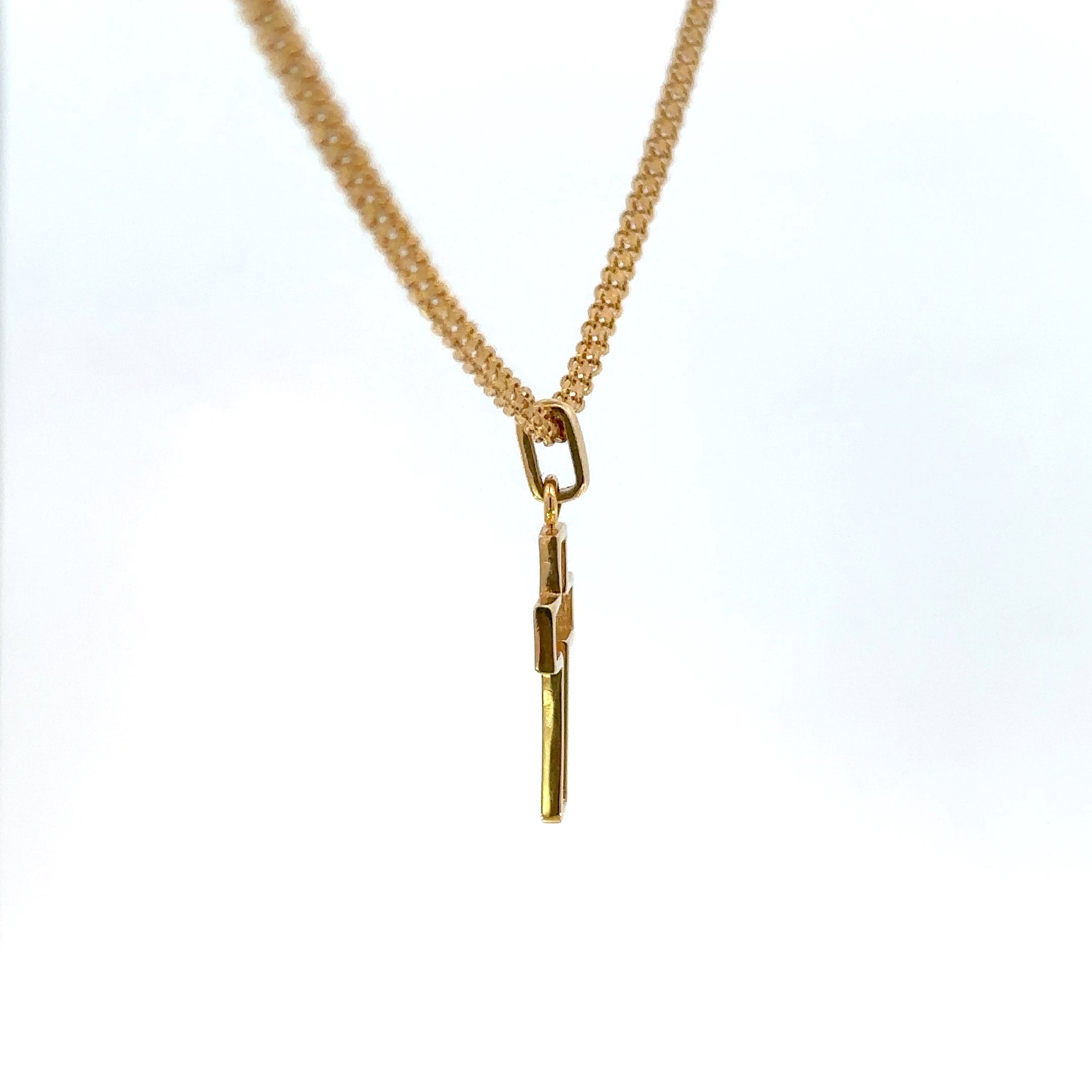 Dije Cruz silueta oro amarillo