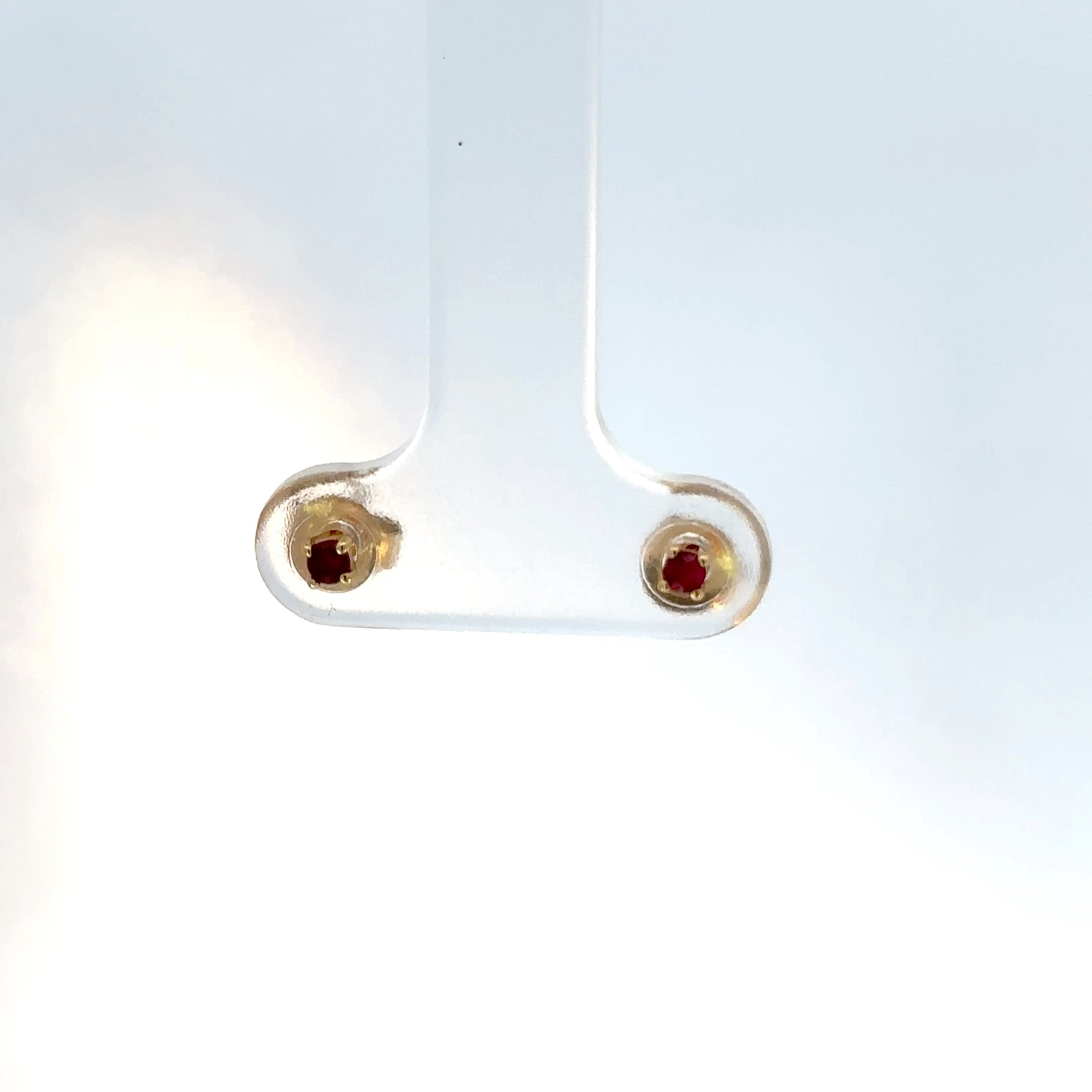 Aretes con Rubies en Oro Amarillo y Oro Blanco