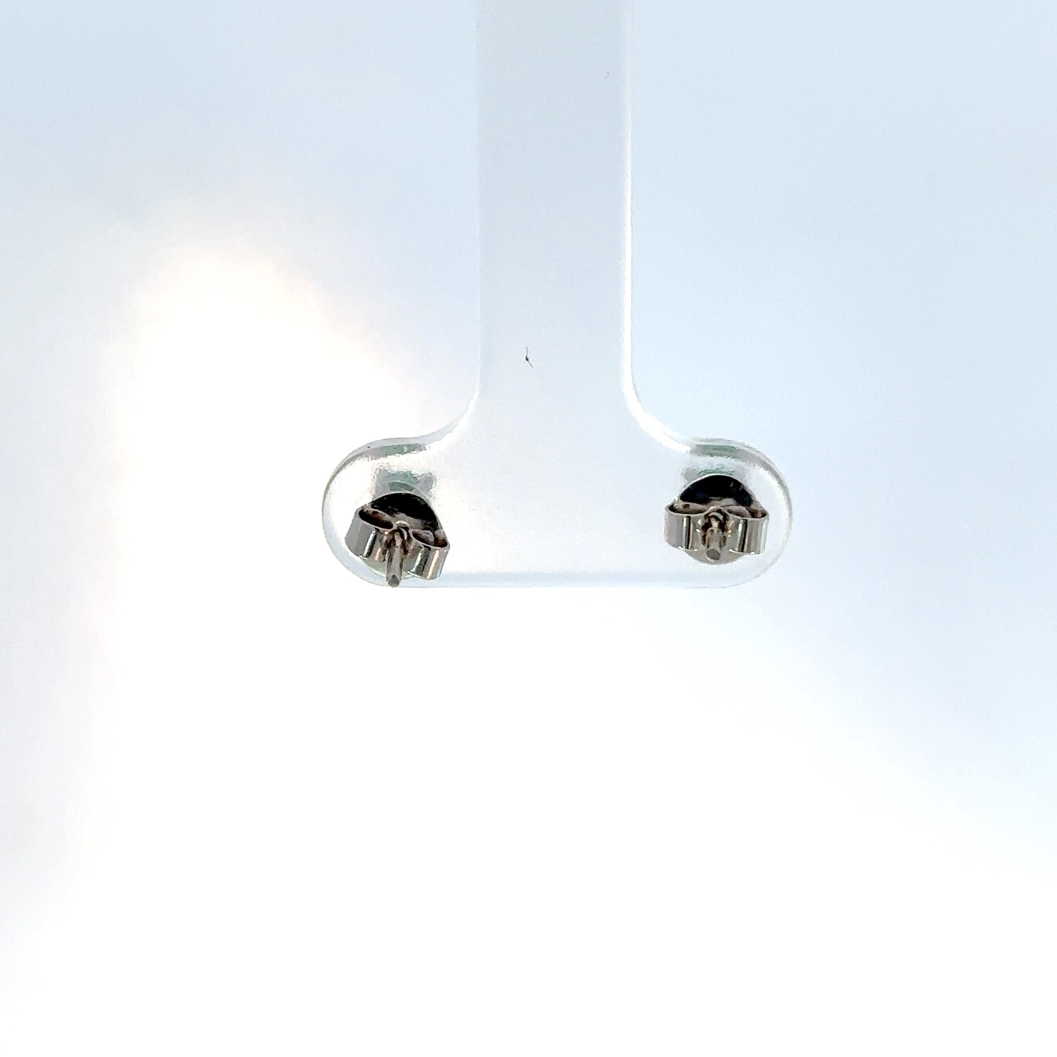 Aretes con Esmeraldas en Oro Blanco